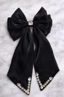 Black satin bow hair clip with crystal detailing for party and evening wear