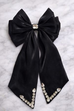 Black satin bow hair clip with crystal detailing for party and evening wear