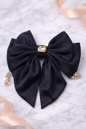 Black satin bow hair clip with crystal and pearl work for party and festive wear