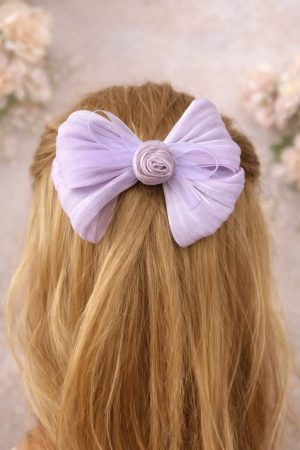 Lavender cute organza bow hair clip styled on hair for everyday wear