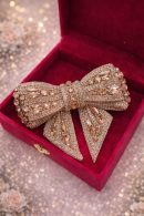 Luxury champagne diamond bow hair clip with crystal detailing for bridal and party wear